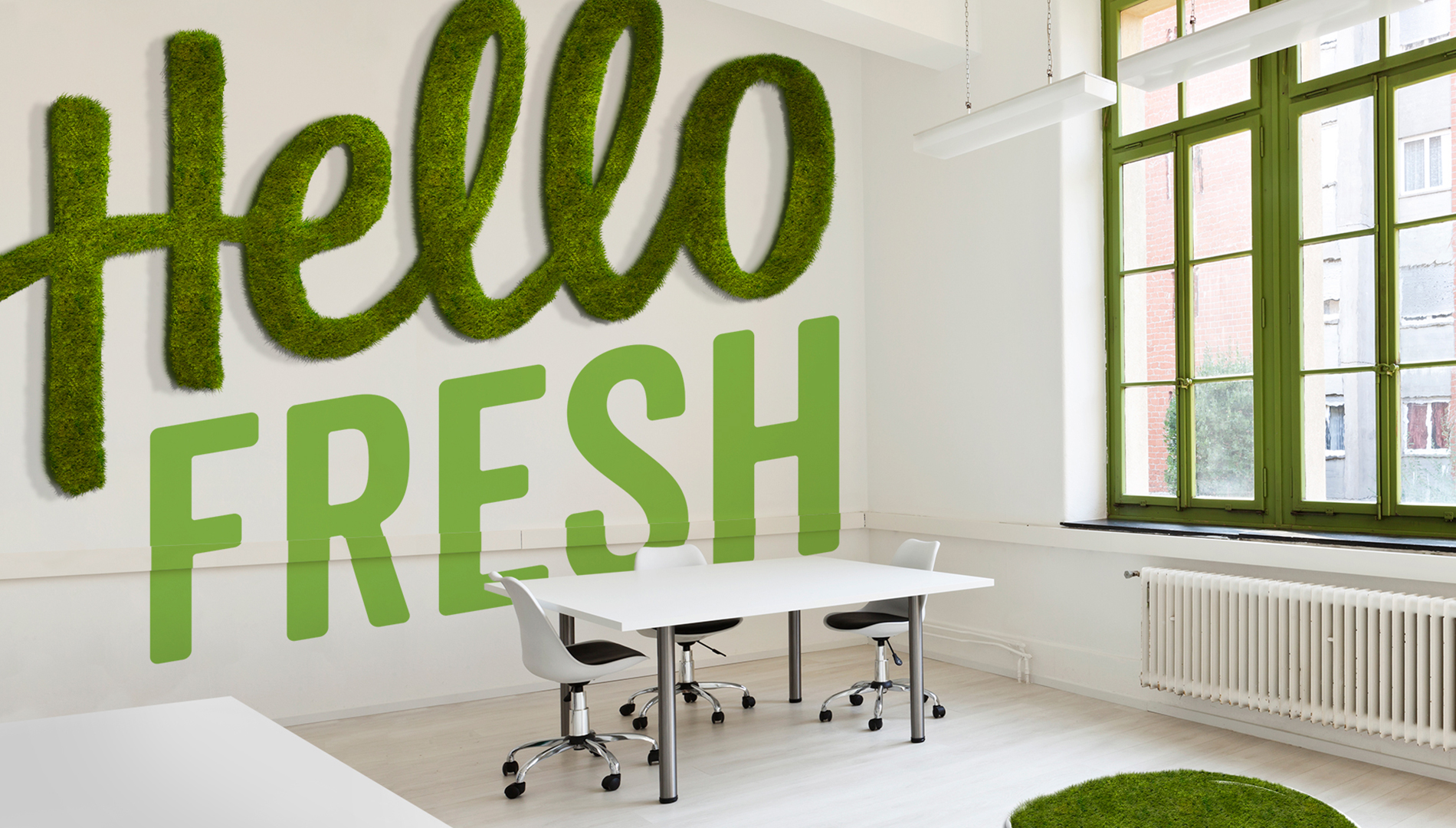 HelloFresh branding on white office wall